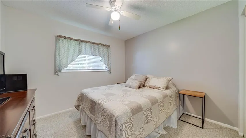 Bedroom No. 2 is freshly painted and has well maintained carpet.