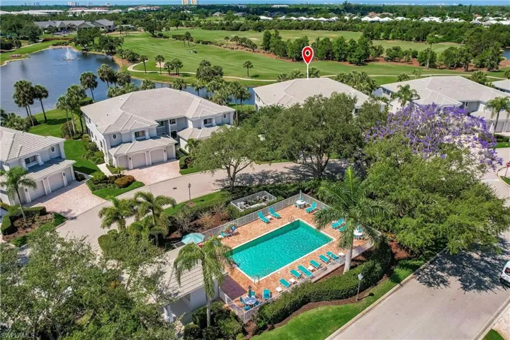 ARIEL VIEW OF POOL AND CONDOS