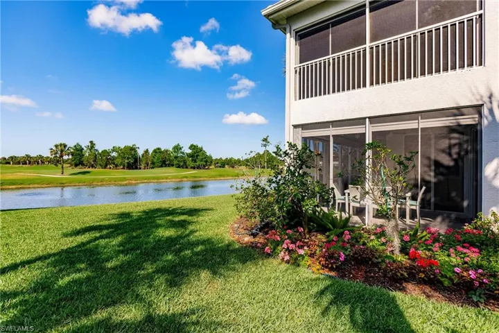 VIEW OF CONDO AND WATER