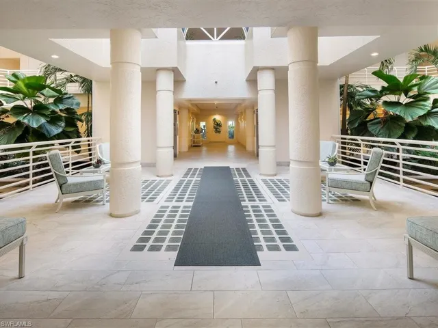 Les Falls grand lobby foyer with water features and open air autrium