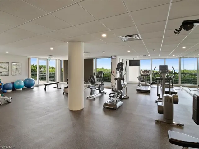 Beachside large fitness room with various equipment and free weights for all type workouts