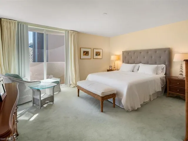 Master bedroom offers space, 2 closets, fresh air from sliding doors on 2 sides and balconies