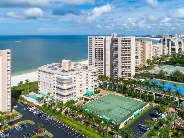 Broader aerial view showing Sandpiper condominium to the north