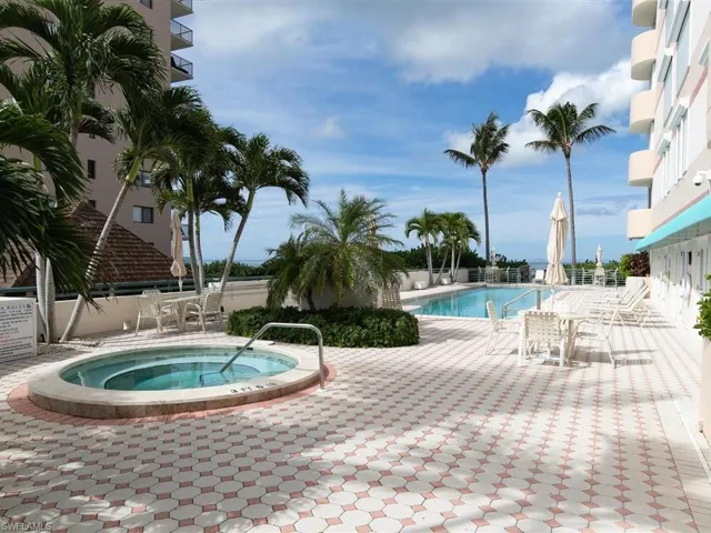 Pool area and hot spa with paver deck