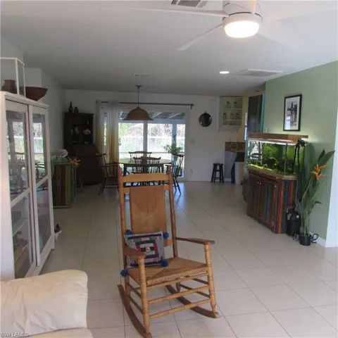 Living room featuring light tile patterned flooring