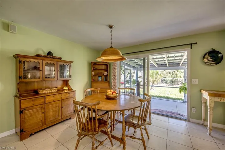 Dining room featuring light tile patterned floors