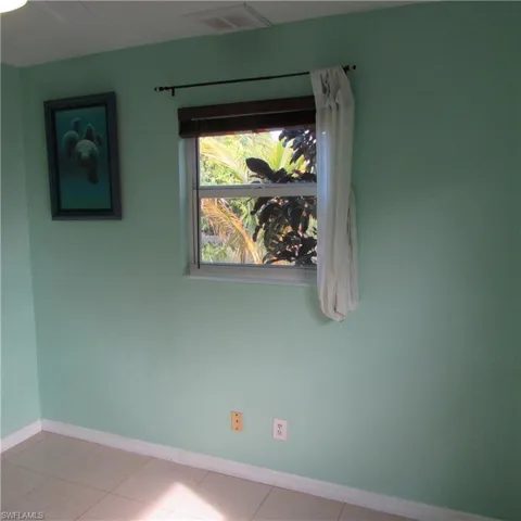 View of tiled spare room