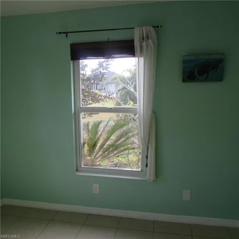 View of tiled empty room