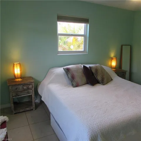 Bedroom featuring light tile patterned floors