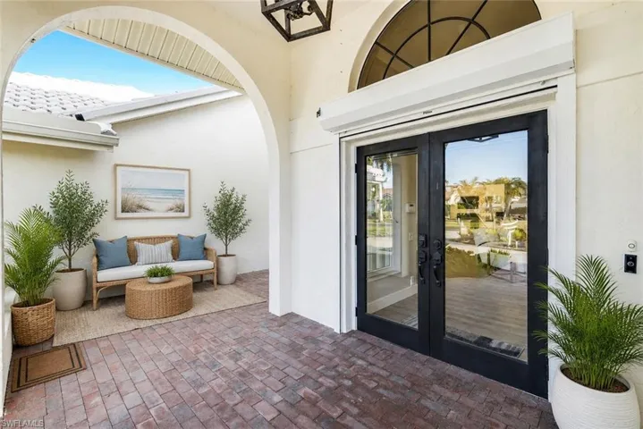 Digitally Staged.Welcome home courtyard entrance!