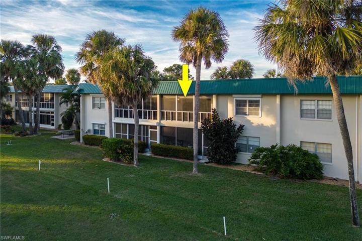Screened balcony overlooking golf course