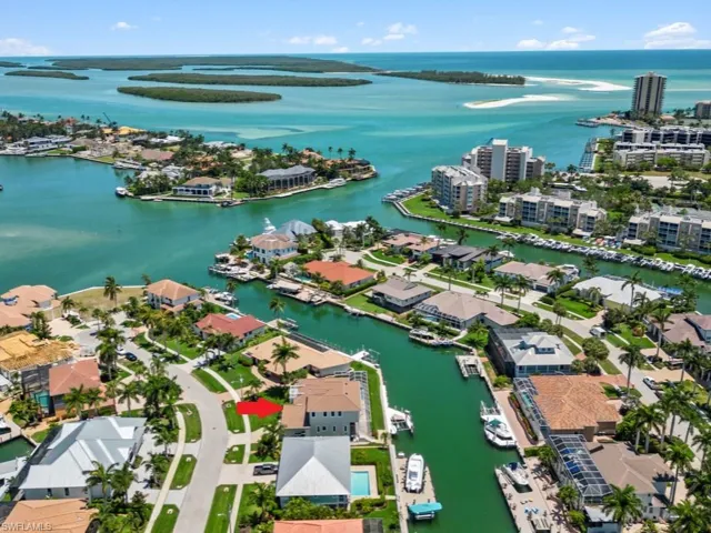 Aerial view of residential area with a large body of water