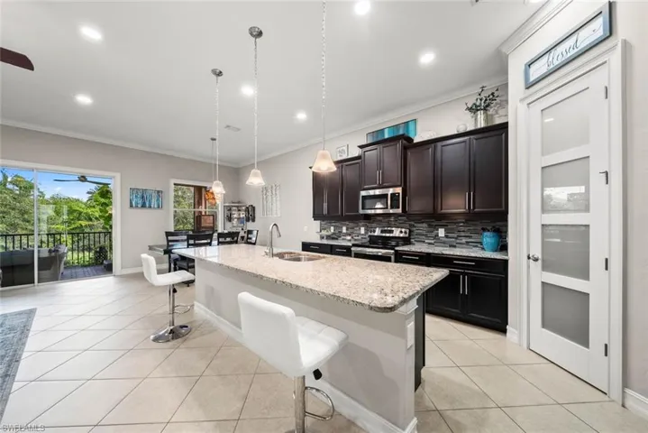 Gourmet kitchen with center island and newer appliances