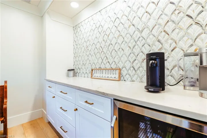 Coffee bar featuring beverage cooler