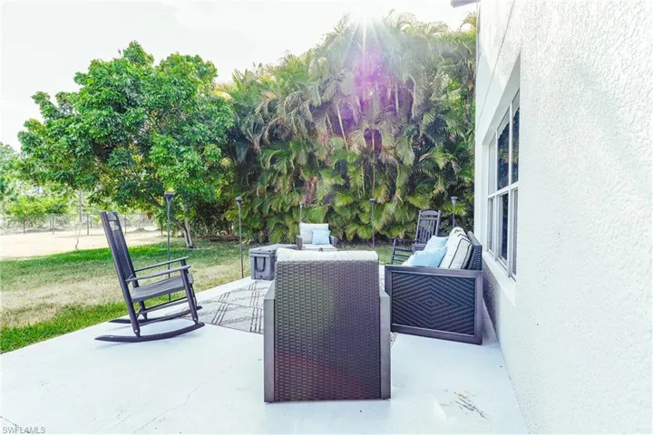 View of patio with fence