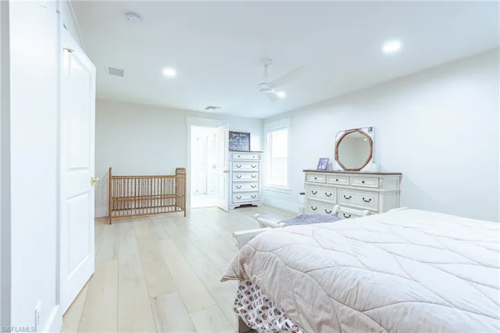Master bedroom looking toward bathroom and large walk-in closet