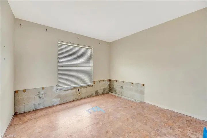 Empty room with baseboards