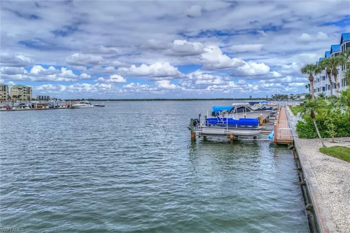 Dock with a water view and boat lift