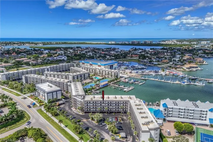 View of urban area with a marina and a nearby body of water