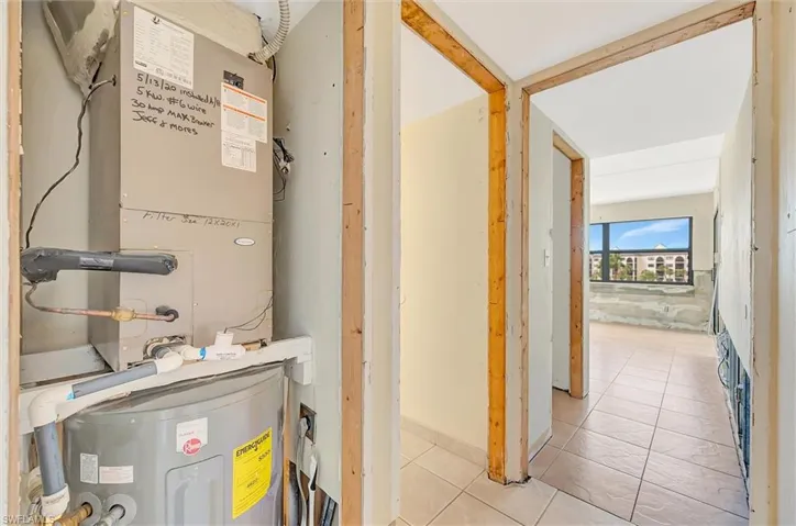 Utility room with heating unit and water heater