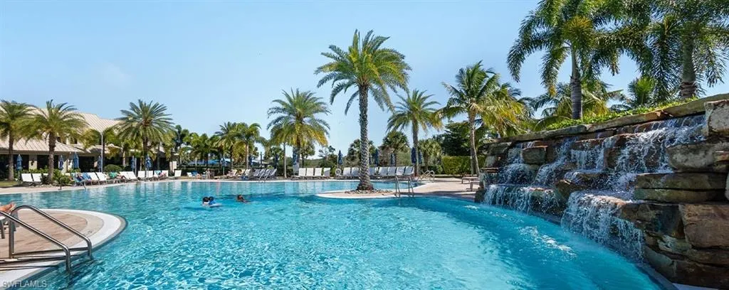 Community pool featuring a patio area
