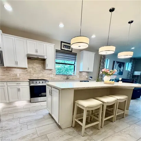 7457 Winding Cypress Dr, Naples, Florida 34114