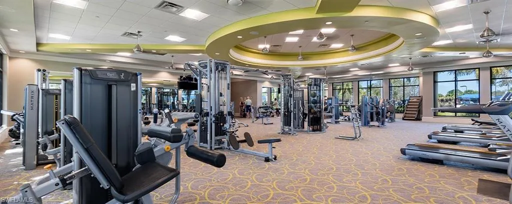 Gym featuring a paneled ceiling