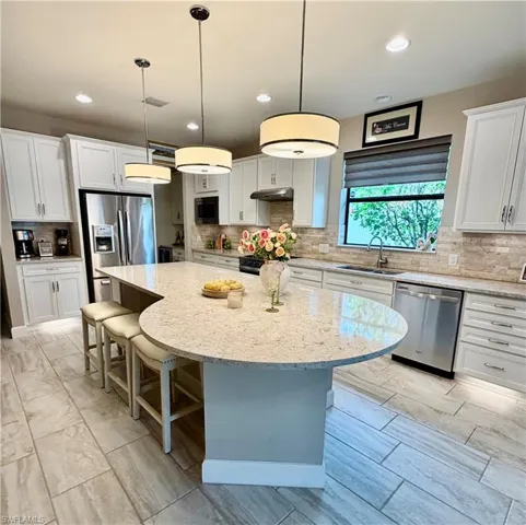 7457 Winding Cypress Dr, Naples, Florida 34114