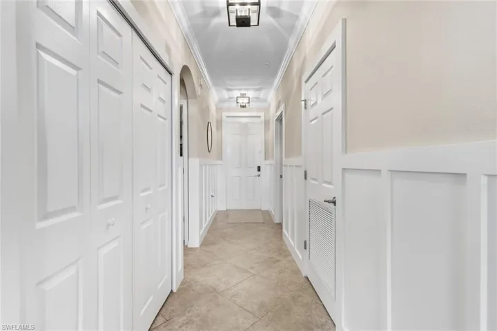 entry, with laundry room in closet