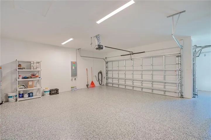Garage with golf cart bay