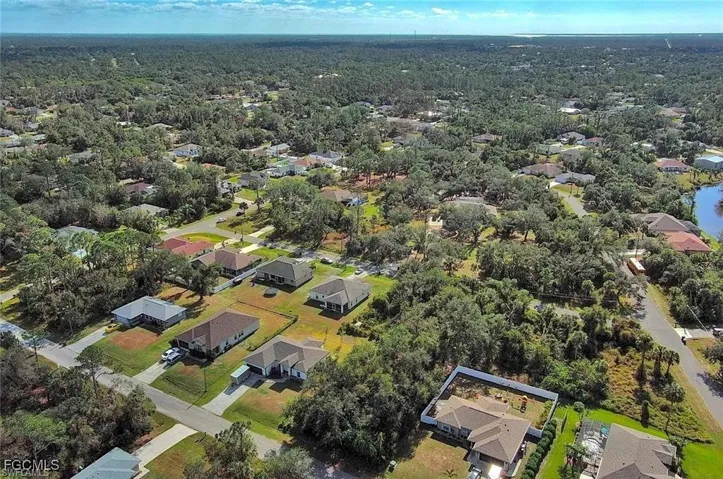 View of property location with nearby suburban area