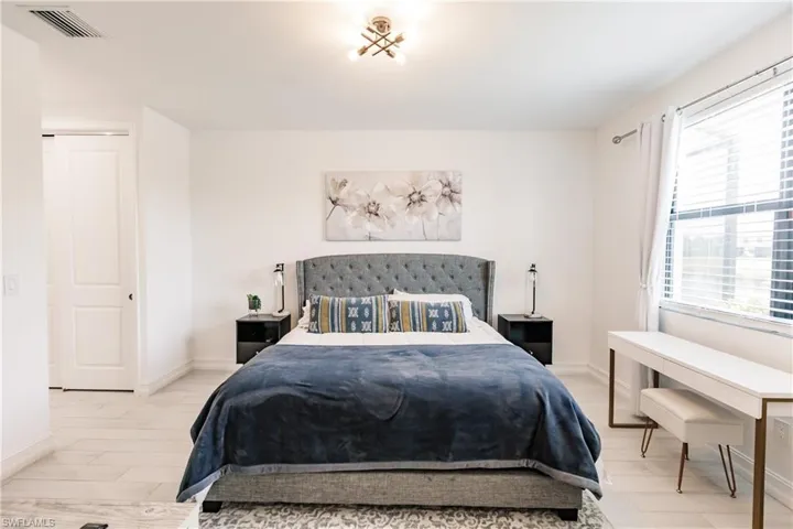 Bedroom with light wood-type flooring