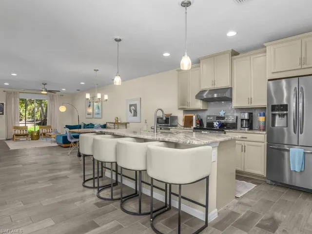 Kitchen - Living Room views - Tile flooring throughout