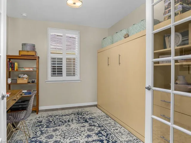 Den with French doors and queen size Murphy bed!