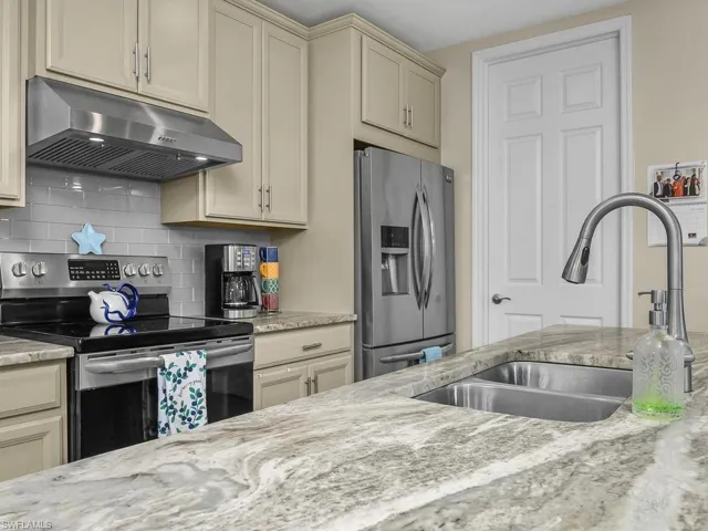 Stainless Steel Appliances with a new over the stove hood