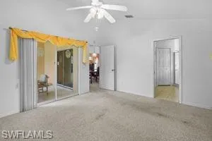 Unfurnished bedroom featuring carpet and ceiling fan