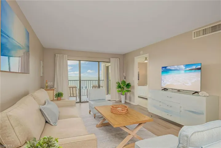 Living area featuring wood finished floors and baseboards
