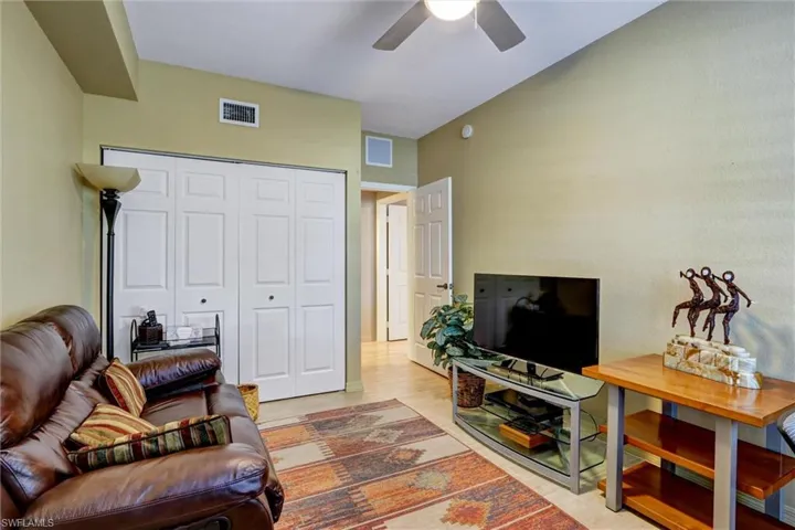 Recessed lighting, ceiling fan, bi-fold closet doors, and wood-finish flooring