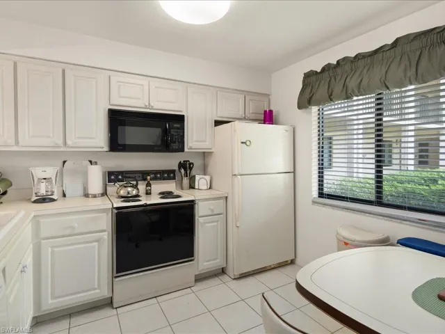 Large windows allow natural light to flood the space.