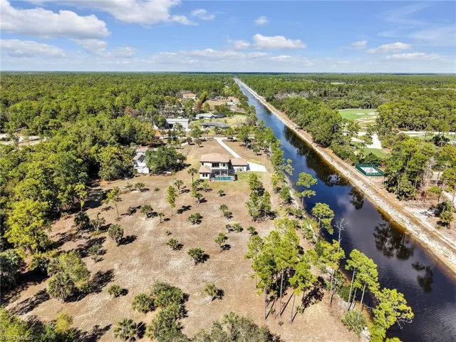 Aerial view showing golf course to the northeast of property (no future development).