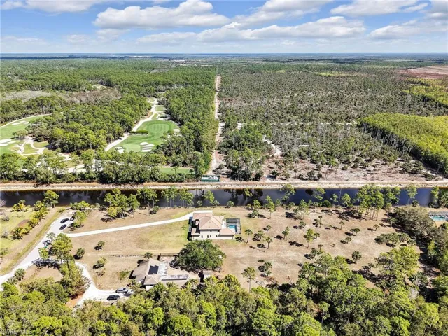 Aerial view of property showing golf course (to the north) and preserve (to the south).  No future development for those areas.