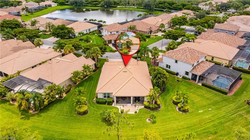 Aerial view of residential area with a large body of water