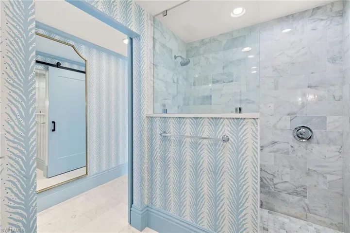 Full bath with recessed lighting and walk in shower