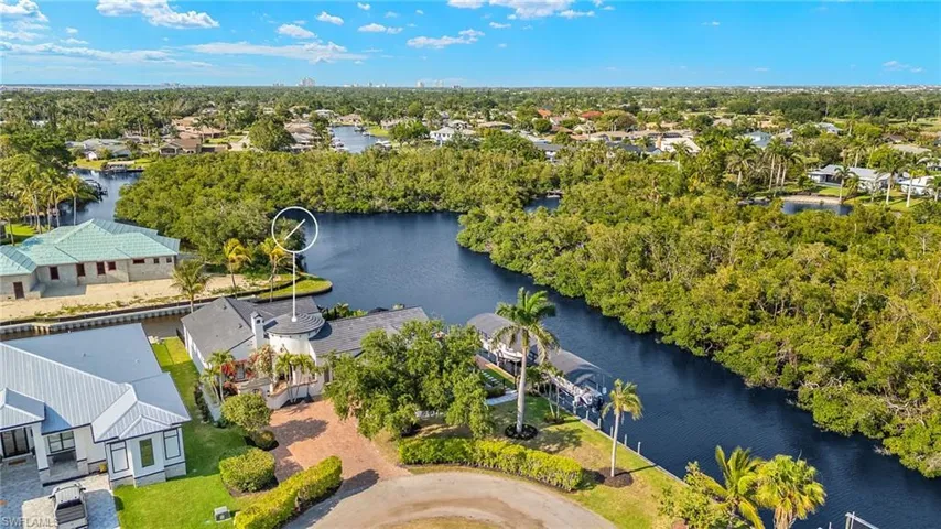 Bird's eye view with a residential view and a water view