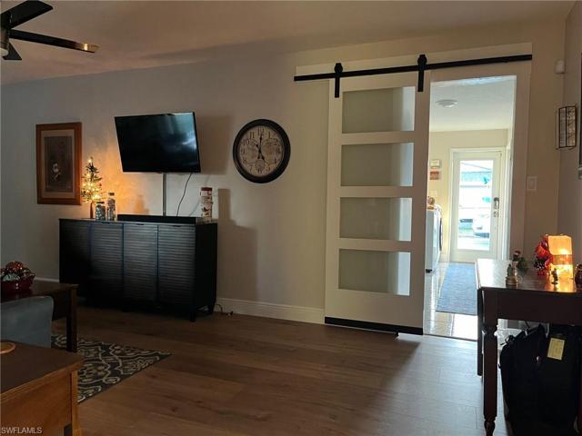 Guest side Living/Family Room. View to Laundry Room