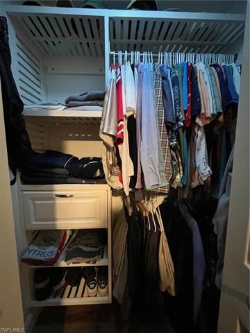 Primary Bedroom "His" Closet