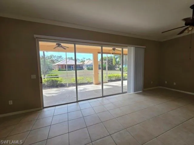 Living room slider access out to large lanai