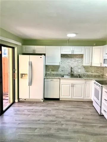 Kitchen showing slider