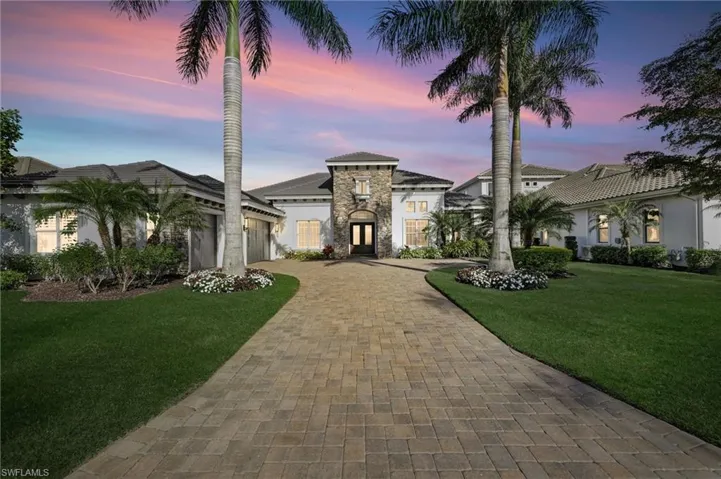 Stunning lakefront Estate in the beautiful and private neighborhood of Salerno, in Miromar Lakes!