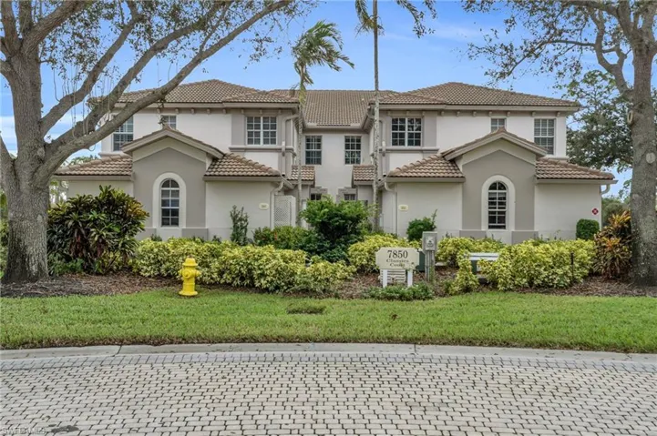 Mediterranean / spanish house featuring a front lawn